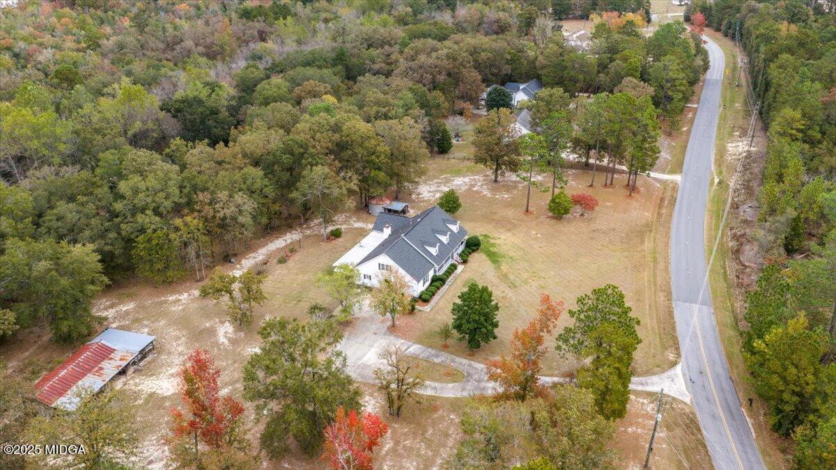5771 Rogers Road Lizella, GA 31052 - Photo 73 of 74 an aerial view of residential houses with outdoor space