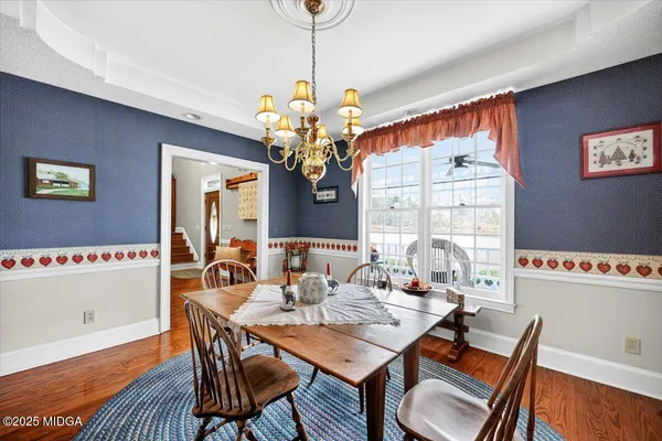 a view of a kitchen and dining room
