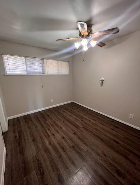 3304 Red River Street, Unit 204 Austin, TX 78705 - Photo 7 of 17 a view of an empty room with wooden floor and a ceiling fan
