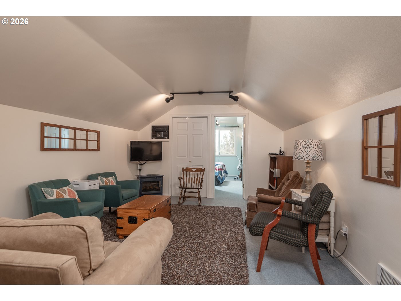 905 Southwest Burns Lane Madras, OR 97741 - Photo 35 of 40 a living room with furniture and a window