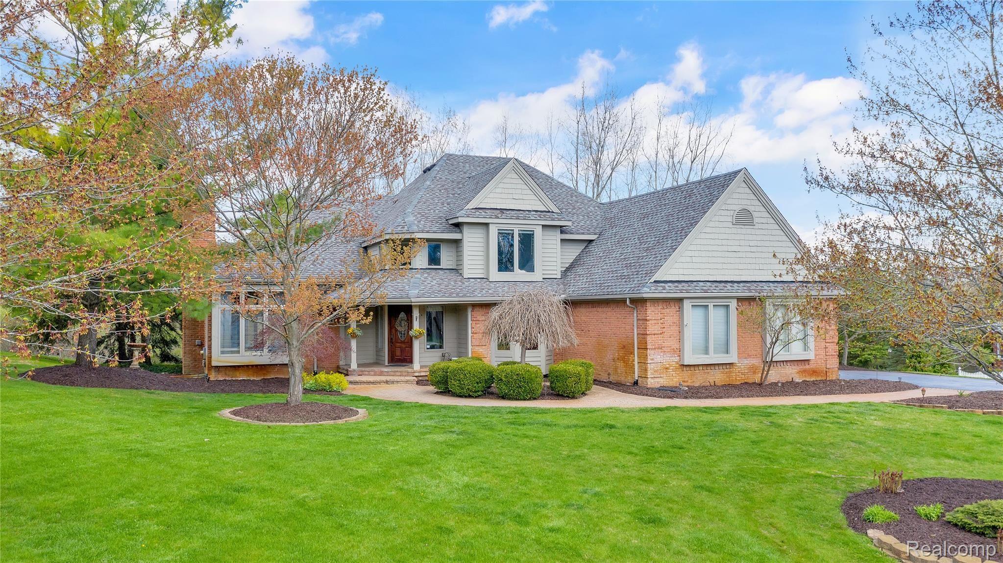 214 Ravineside Drive Milford, MI 48381 - Photo 1 of 46 DJI_0610.jpg