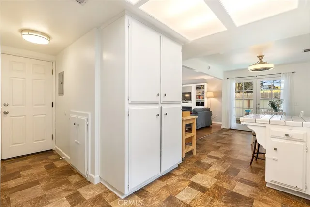 a view of kitchen with center island and stainless steel appliances