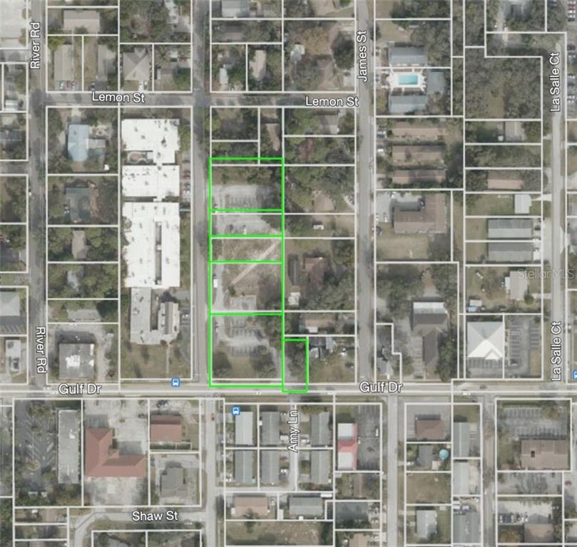5421 Gulf Drive New Port Richey, FL 34652 - Photo 1 of 1 a view of a building with a window