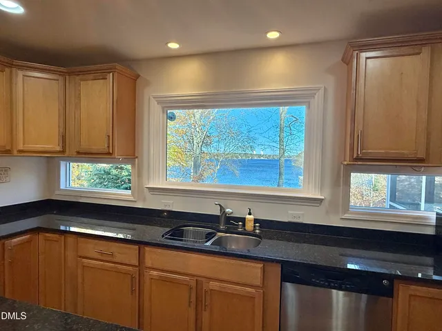 a view of a window and chair in a room