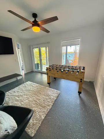 a bathroom with a sink toilet and mirror