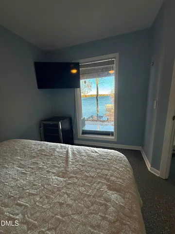 a view of house with yard entertaining space