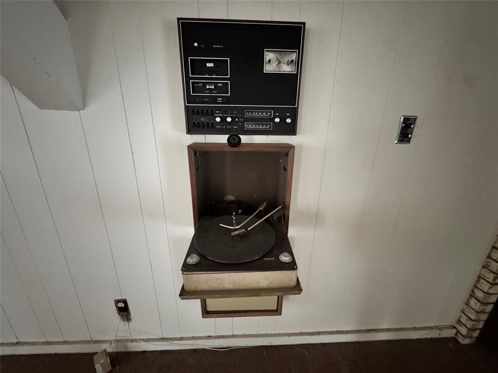 3909 Smothers Road Caney City, TX 75148 - Photo 7 of 35 a room with wooden floor and shoes