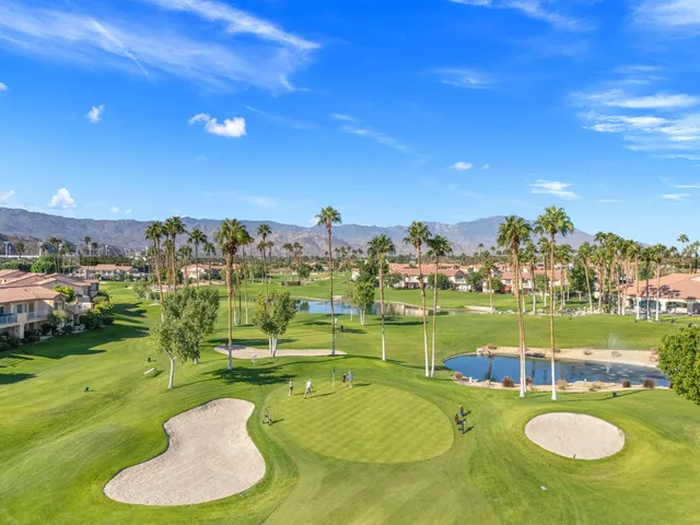 a view of a golf course with a garden