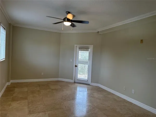 a view of a room that has a large window