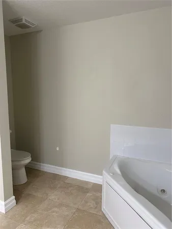 a bathroom with a sink double vanity and a mirror