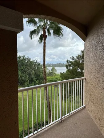 a view of a porch with a big yard