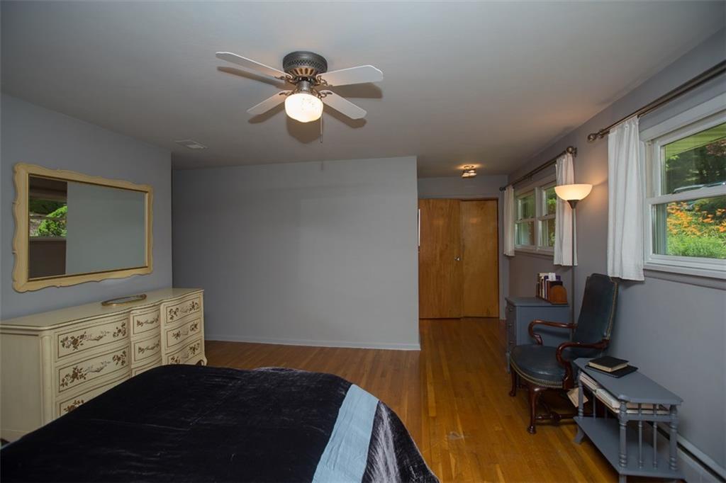 732 Scrubgrass Road Mt. Lebanon, PA 15243 - Photo 11 of 25 Hardwood floors & ceiling fan are offered in the master.