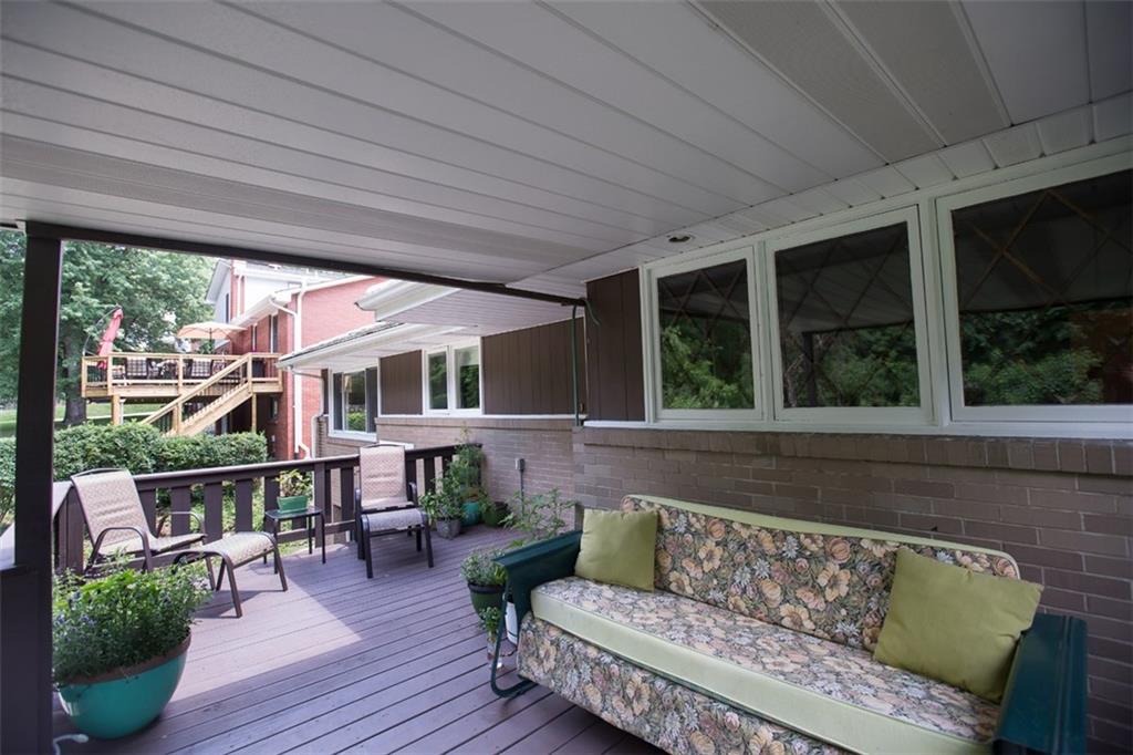 732 Scrubgrass Road Mt. Lebanon, PA 15243 - Photo 21 of 25 The partially covered deck area with steps down to the backyard.