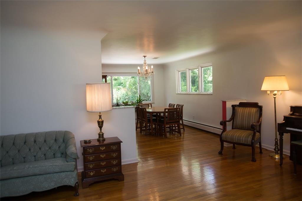 732 Scrubgrass Road Mt. Lebanon, PA 15243 - Photo 6 of 25 Hardwood floors continue into the formal dining room with this open floor plan.