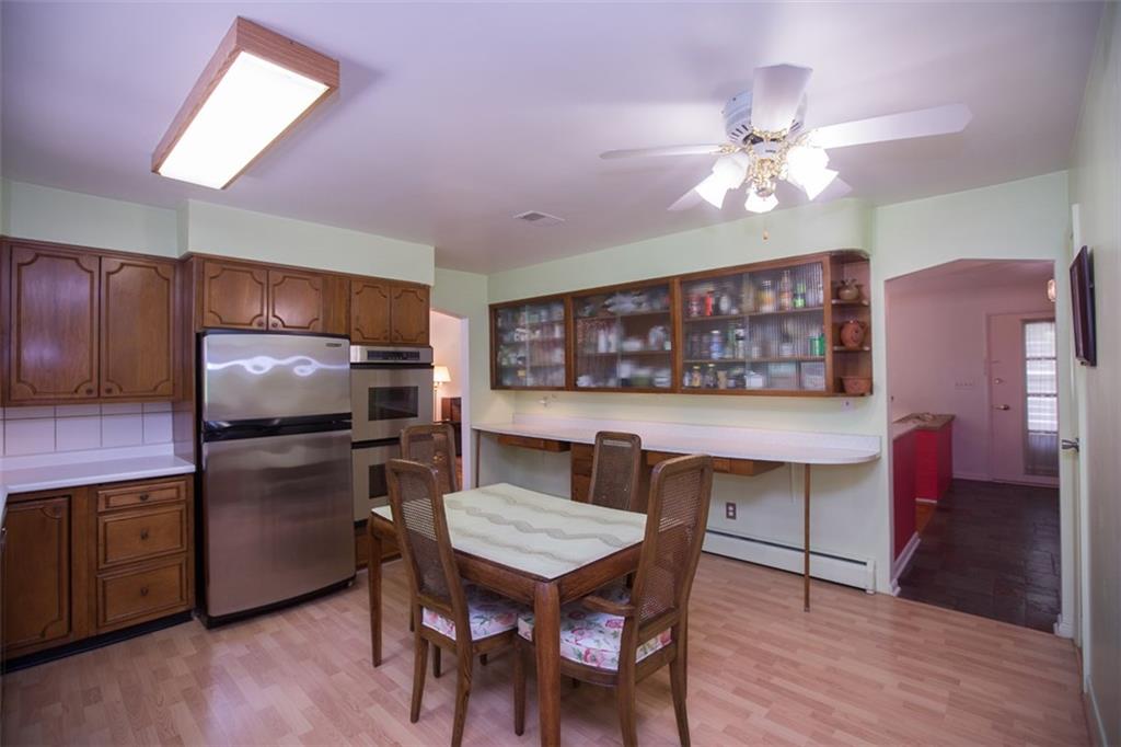 732 Scrubgrass Road Mt. Lebanon, PA 15243 - Photo 7 of 25 Kitchen features stainless steel appliances and a DOUBLE oven!