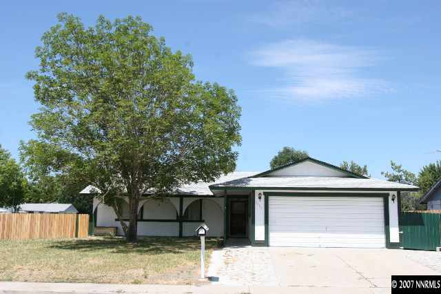 2897 Jake Street Reno, NV 89502 - Photo 1 of 5 a front view of a house with a yard