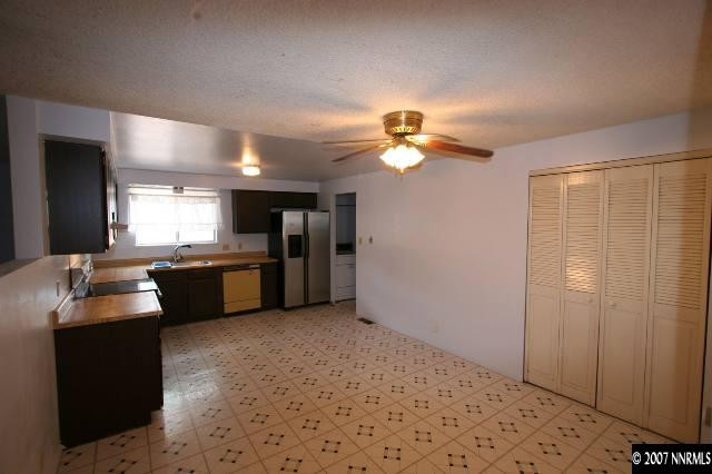 2897 Jake Street Reno, NV 89502 - Photo 2 of 5 a kitchen with a sink cabinets and appliances