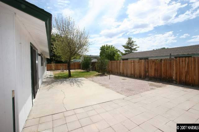 2897 Jake Street Reno, NV 89502 - Photo 5 of 5 a view of a backyard with pathway