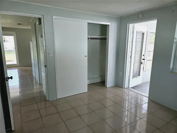 a view of an empty room and window