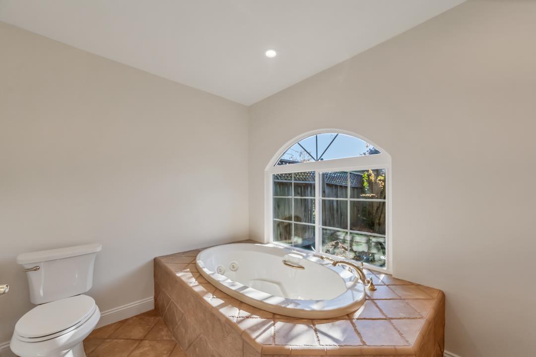 9971 Broadmoor Drive San Ramon, CA 94583 - Photo 27 of 35 a bathroom with a sink toilet and shower
