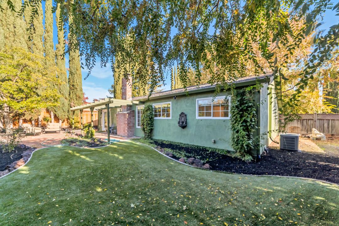 9971 Broadmoor Drive San Ramon, CA 94583 - Photo 31 of 35 a front view of a house with a garden