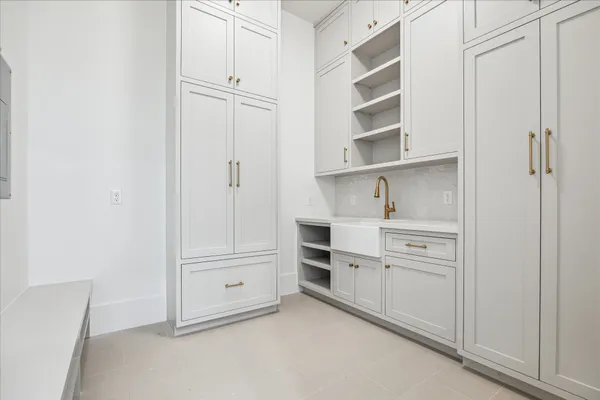 a view of cabinets and closet