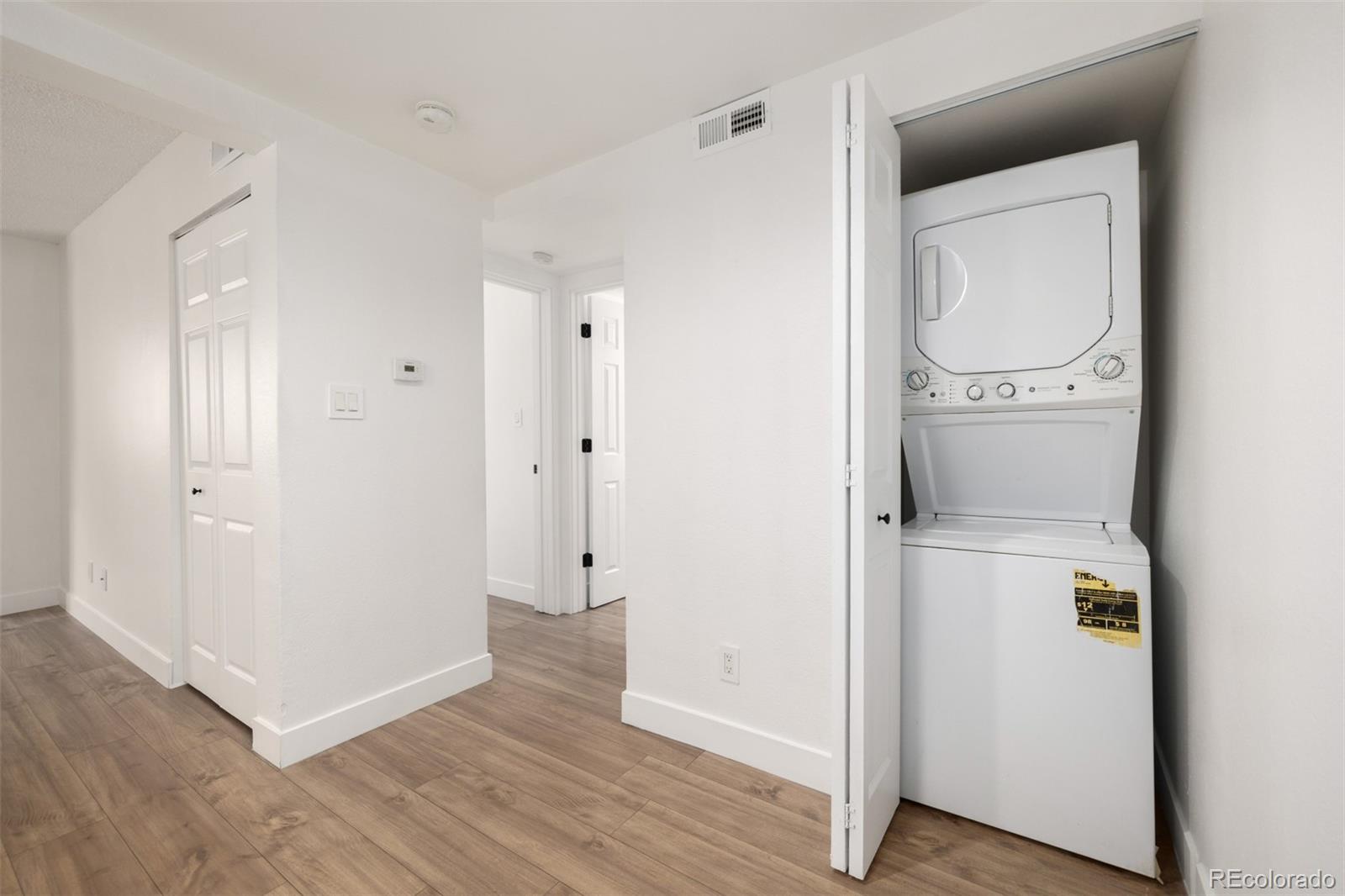 2929 West Floyd Avenue, Unit 201 Denver, CO 80236 - Photo 22 of 28 a view of an empty room