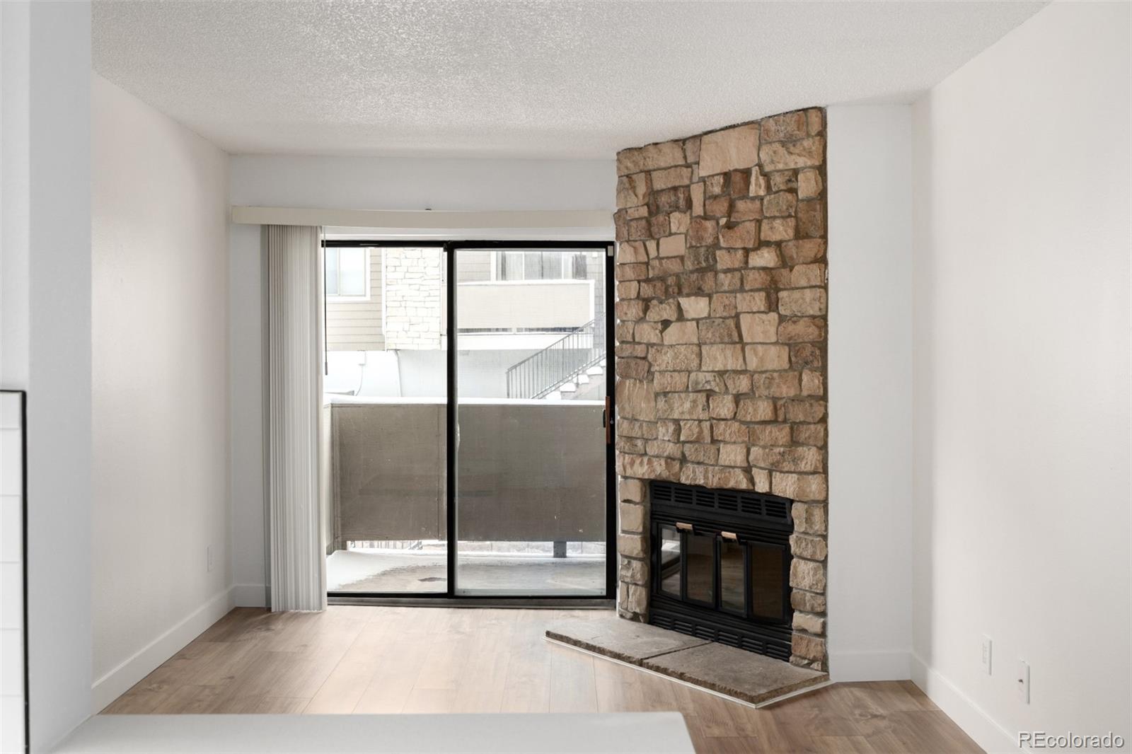 2929 West Floyd Avenue, Unit 201 Denver, CO 80236 - Photo 4 of 28 a view of livingroom with furniture