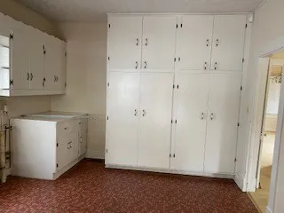 a view of room with white walls