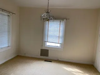 a view of a room with a window