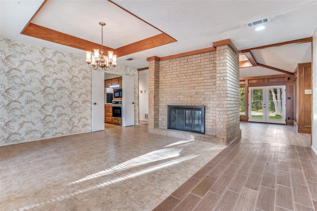 3008 Old Mill Run Grapevine, TX 76051 - Photo 10 of 38 a view of a livingroom with a fireplace