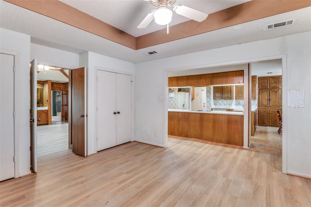 3008 Old Mill Run Grapevine, TX 76051 - Photo 15 of 38 a view of wooden floor and windows in a room