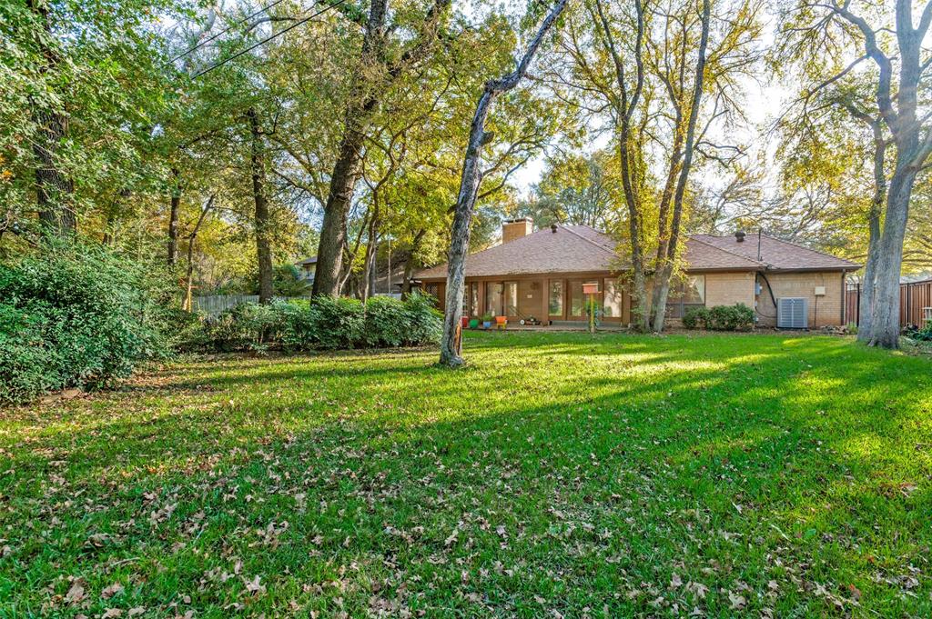 3008 Old Mill Run Grapevine, TX 76051 - Photo 32 of 38 a front view of a house with garden