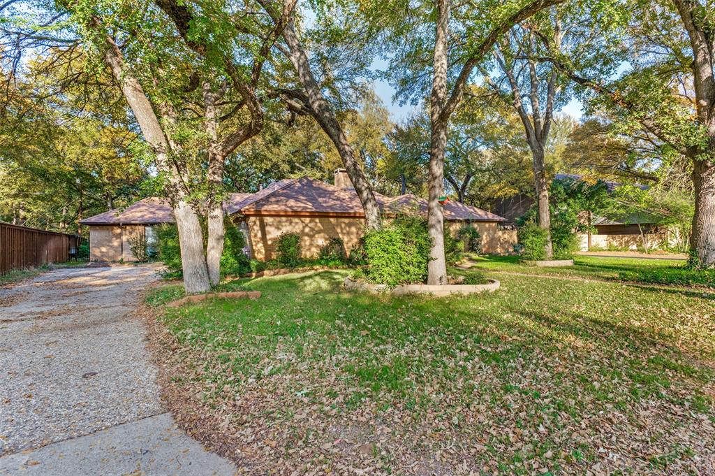 3008 Old Mill Run Grapevine, TX 76051 - Photo 3 of 38 a view of a house with a tree s
