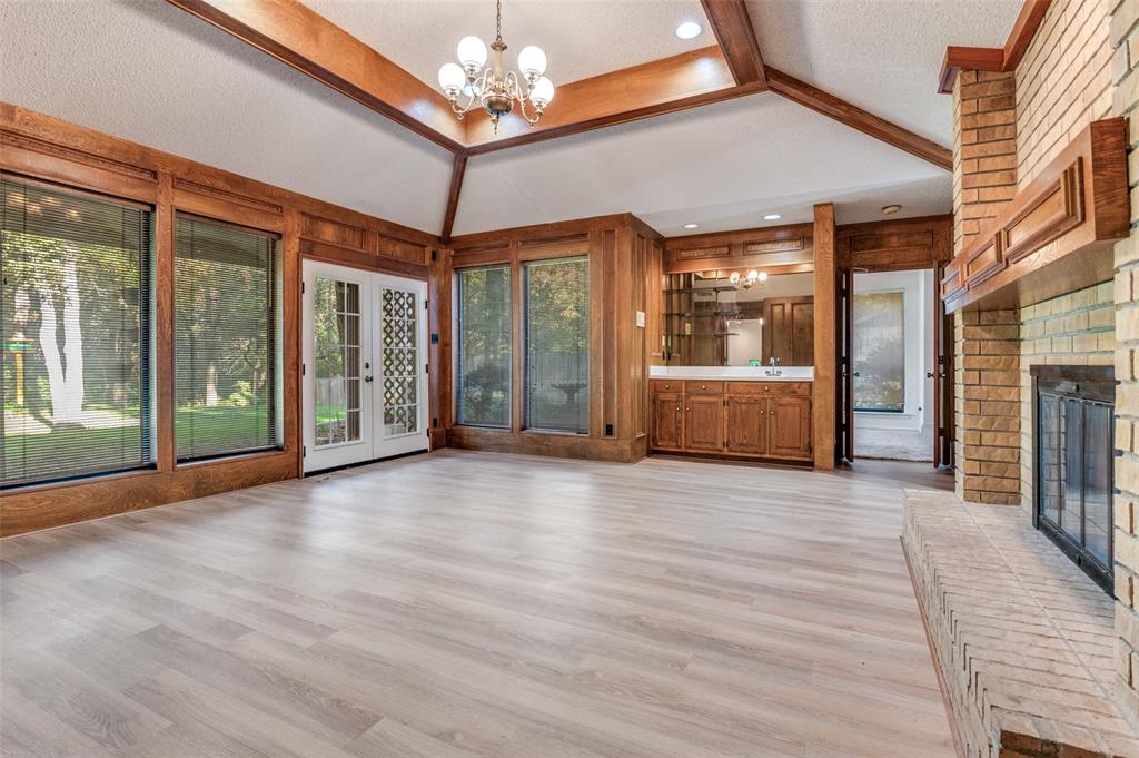 3008 Old Mill Run Grapevine, TX 76051 - Photo 8 of 38 an empty room with wooden floor and windows
