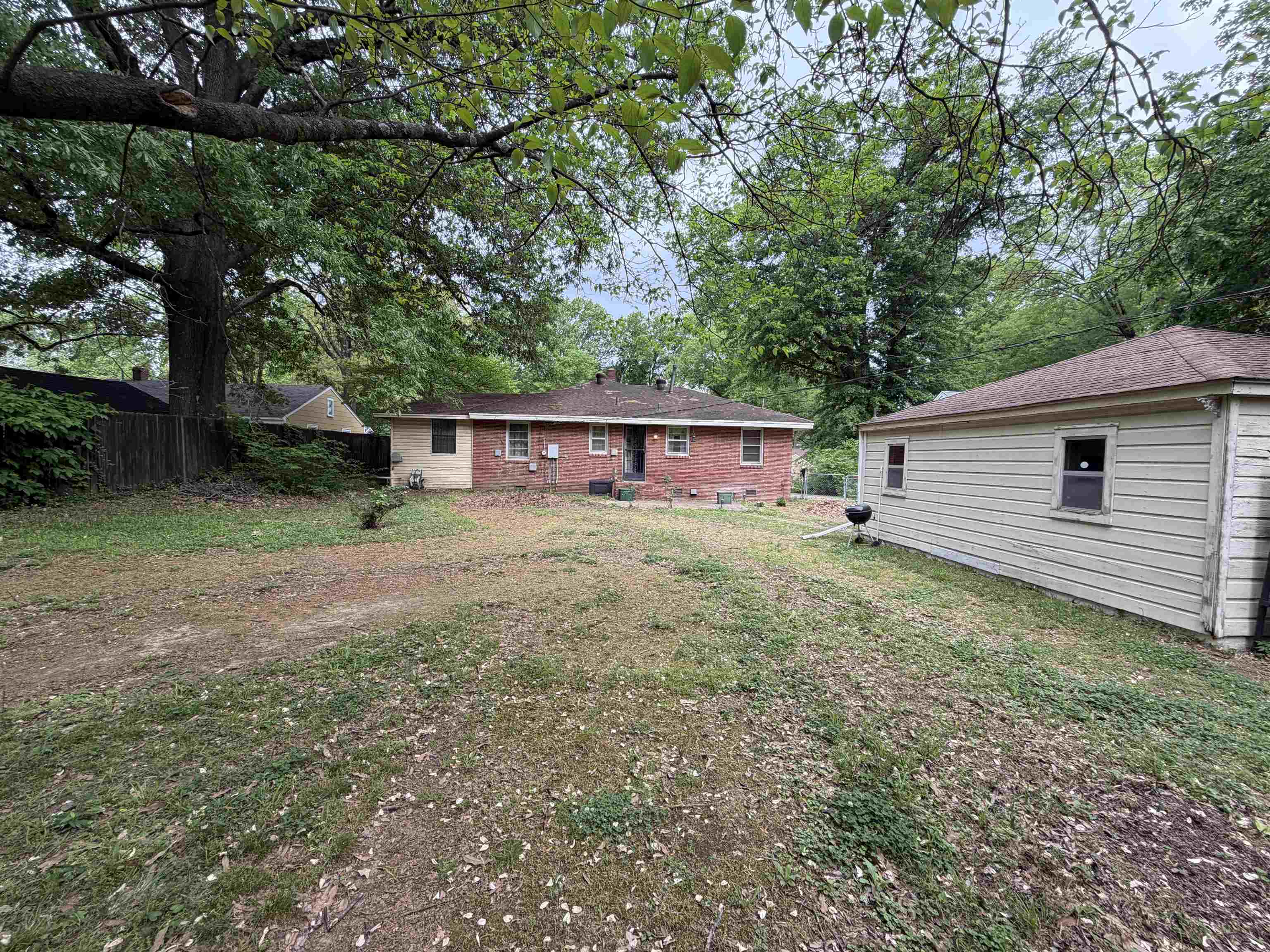 974 Tatum Road Memphis, TN 38122 - Photo 11 of 11 Rear view of house with brick siding