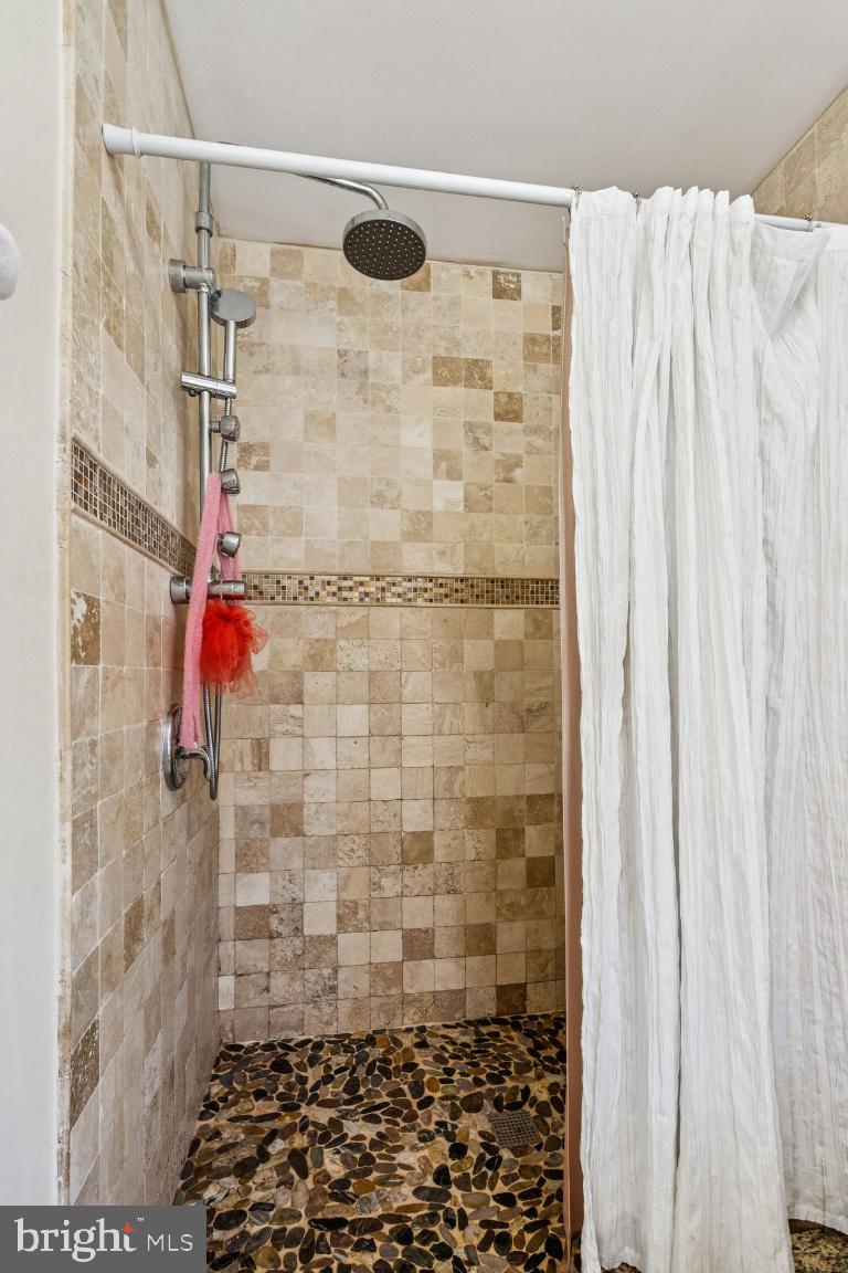 902 Rural Avenue Voorhees, NJ 08043 - Photo 18 of 25 a bathroom with a shower