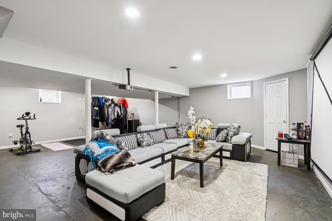 902 Rural Avenue Voorhees, NJ 08043 - Photo 21 of 25 a living room with furniture and wooden floor