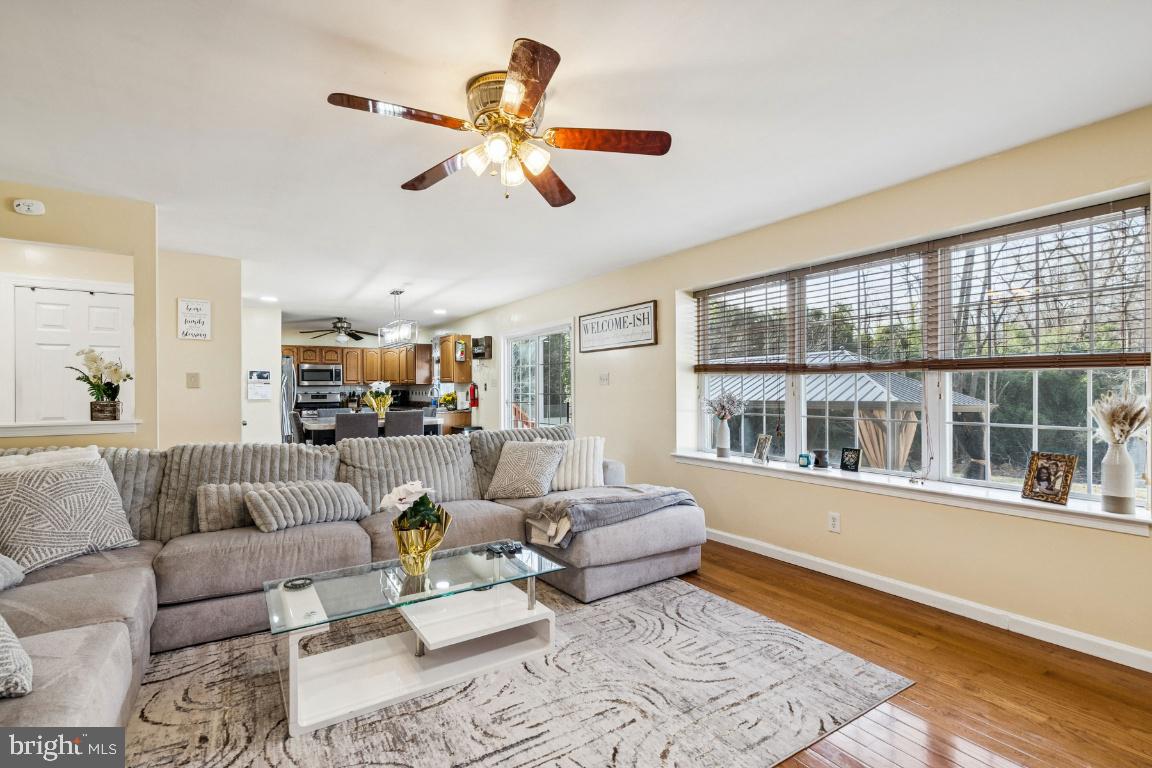 902 Rural Avenue Voorhees, NJ 08043 - Photo 7 of 25 a living room with furniture and a window
