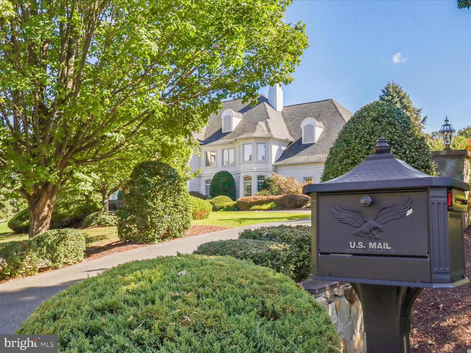 12709 Greenbriar Road Potomac, MD 20854 - Photo 12 of 120 Elegant home with lush landscaping.