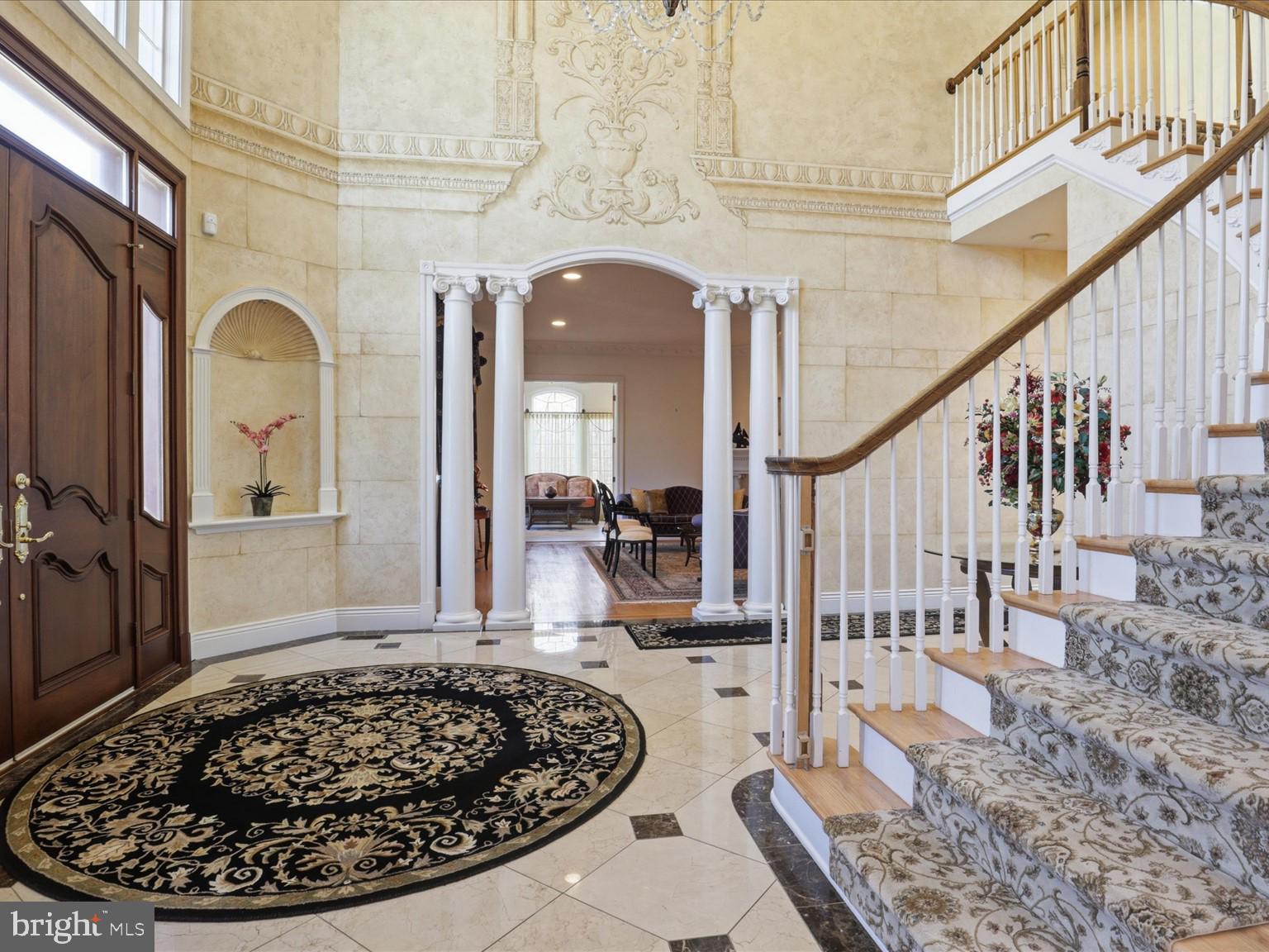 12709 Greenbriar Road Potomac, MD 20854 - Photo 20 of 120 Elegant foyer with grand staircase.