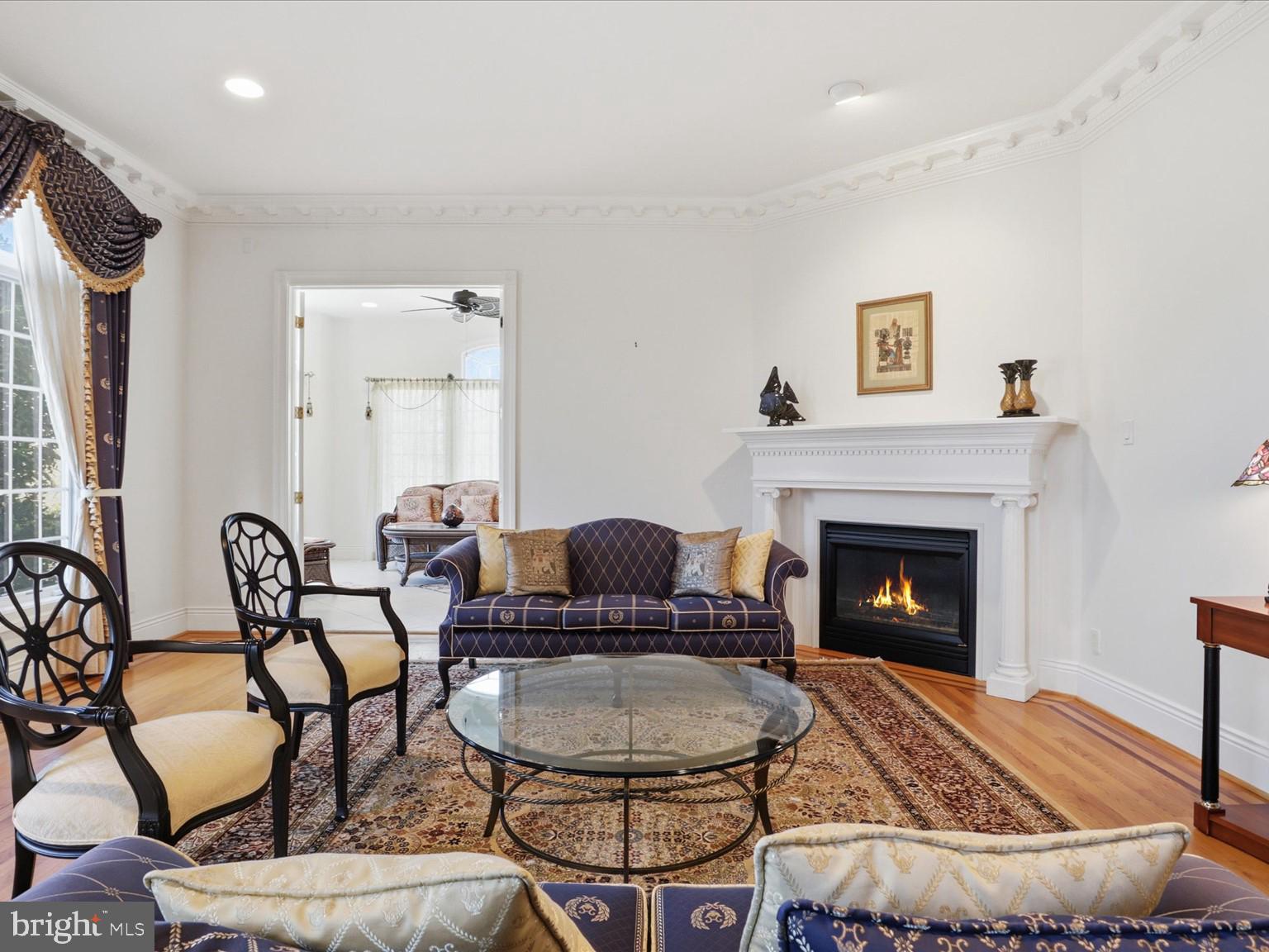 12709 Greenbriar Road Potomac, MD 20854 - Photo 25 of 120 Elegant living space with cozy fireplace.