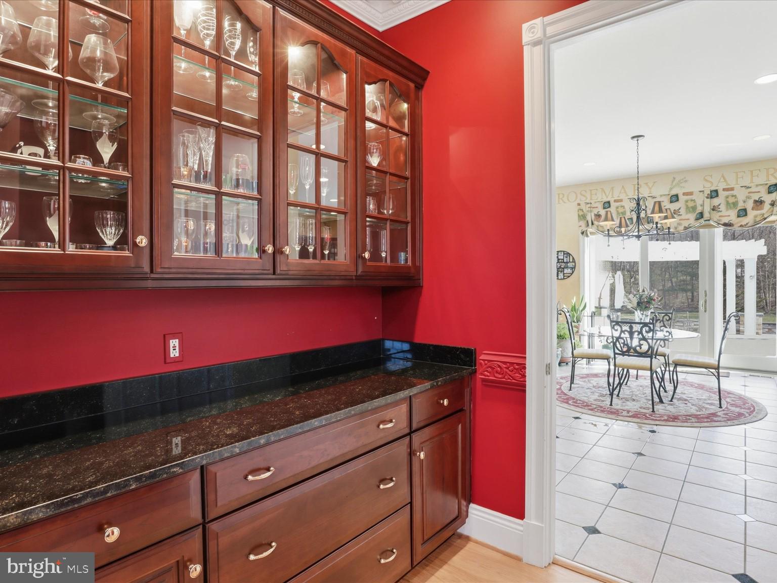 12709 Greenbriar Road Potomac, MD 20854 - Photo 33 of 120 Elegant red-hued dining space.