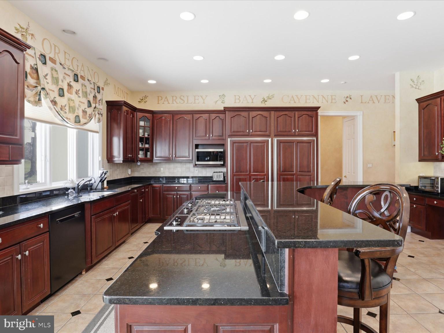 12709 Greenbriar Road Potomac, MD 20854 - Photo 46 of 120 Elegant kitchen with rich cabinetry.