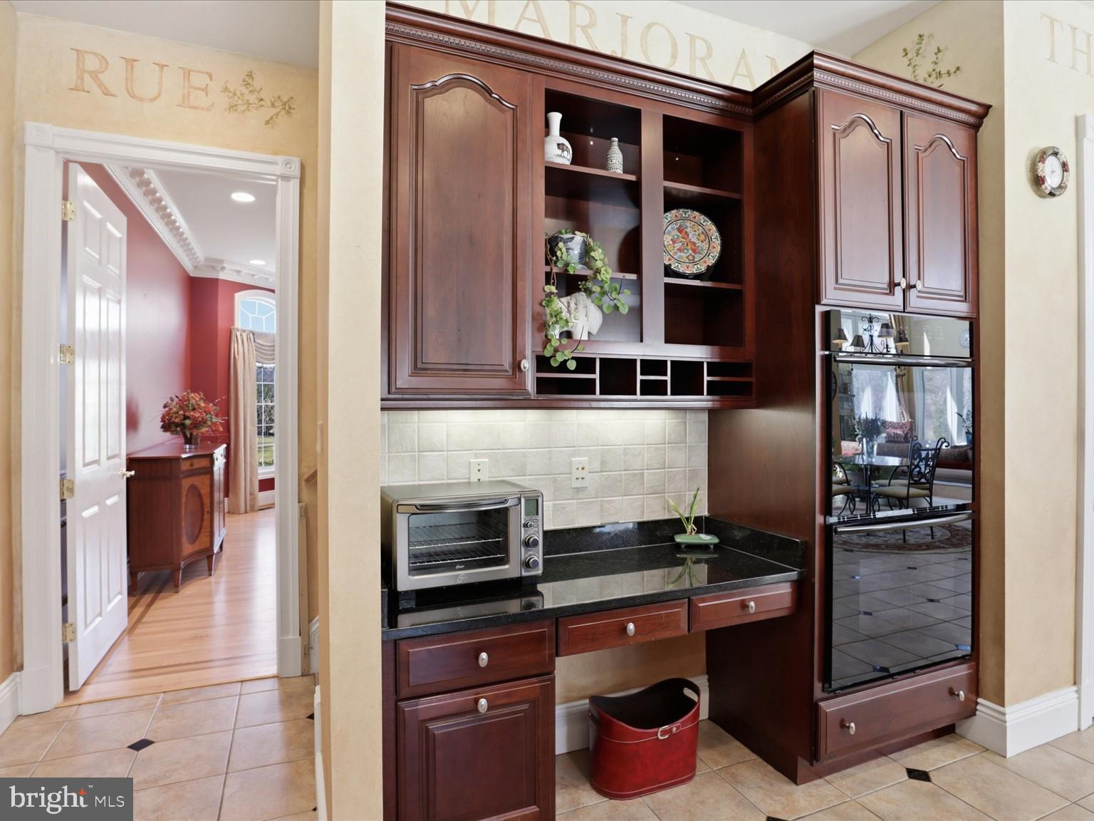 12709 Greenbriar Road Potomac, MD 20854 - Photo 49 of 120 Elegant kitchen with rich cabinetry.