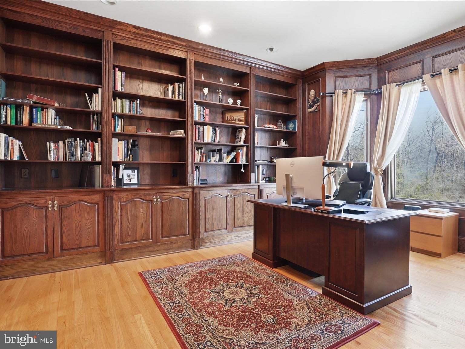 12709 Greenbriar Road Potomac, MD 20854 - Photo 54 of 120 Elegant home office with rich wood accents.