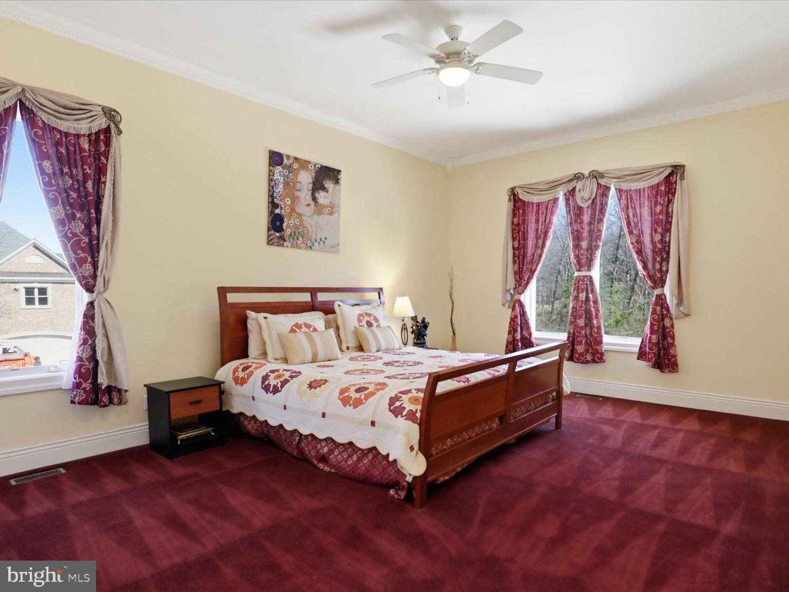 12709 Greenbriar Road Potomac, MD 20854 - Photo 55 of 120 Elegant bedroom with vibrant decor.