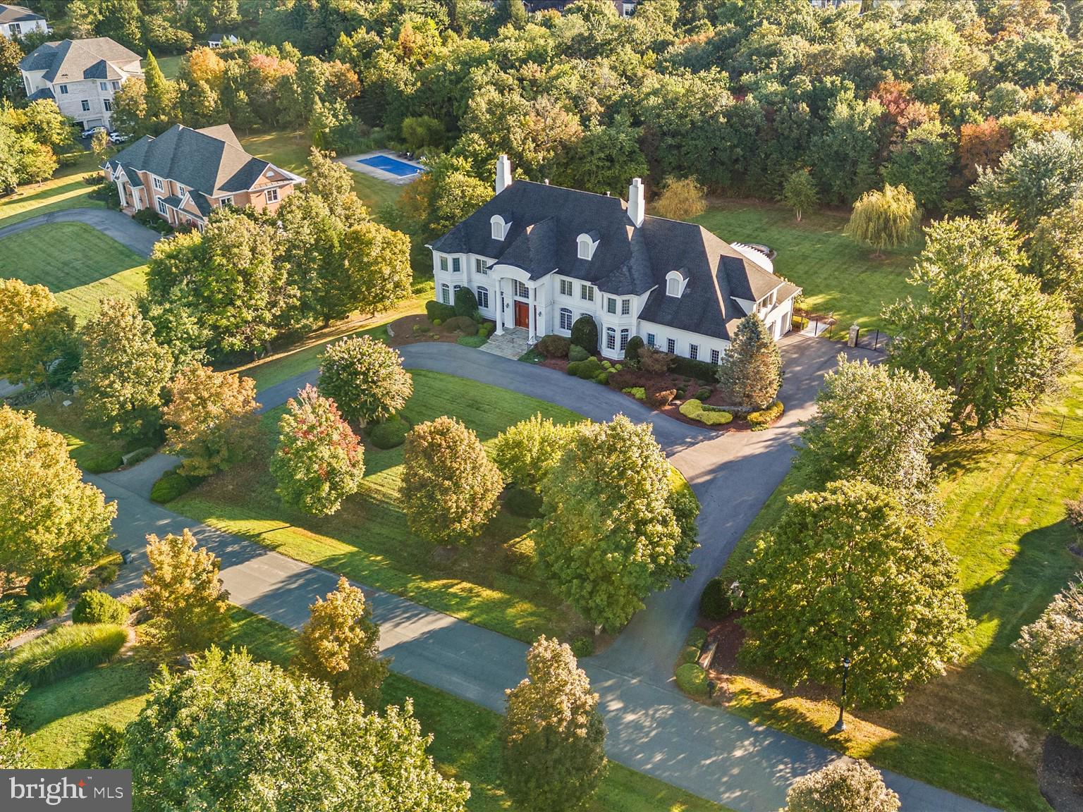 12709 Greenbriar Road Potomac, MD 20854 - Photo 10 of 120 Elegant estate amidst lush greenery.
