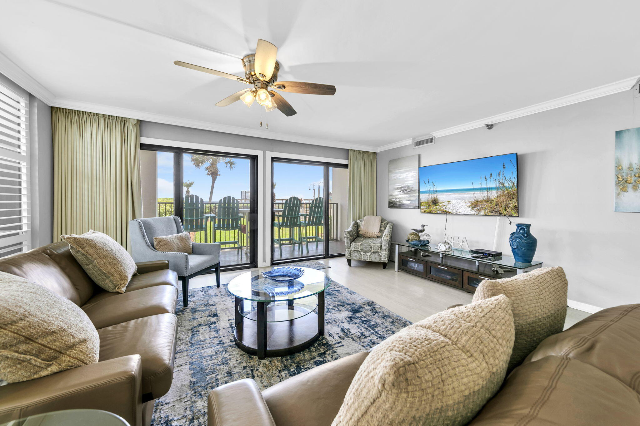 1044 Highway 98, Unit 101 Destin, FL 32541 - Photo 1 of 33 a living room with furniture and a large window