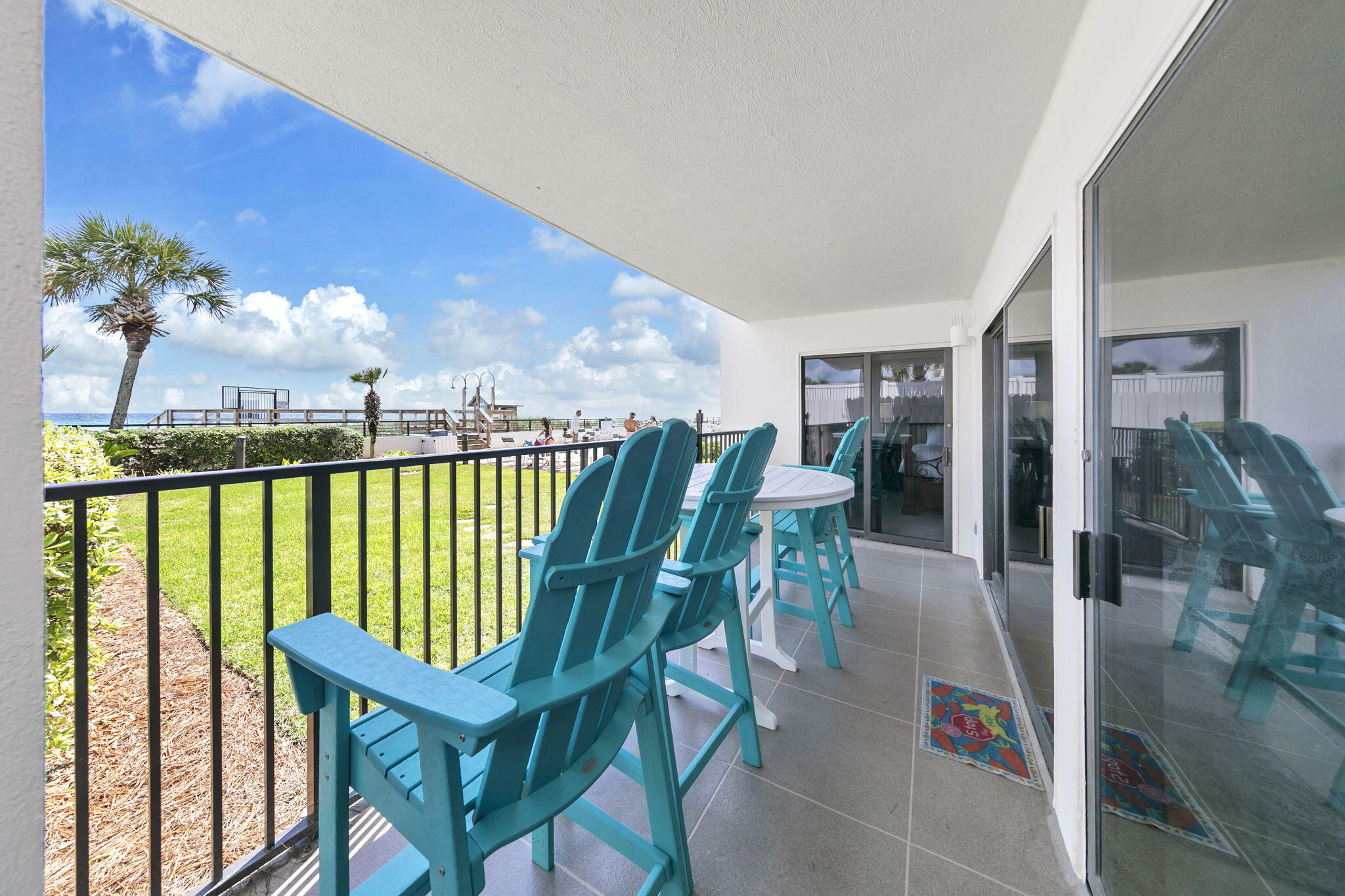 1044 Highway 98, Unit 101 Destin, FL 32541 - Photo 24 of 33 a view of a balcony with chairs